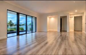 Flooring installation in a bright modern living room